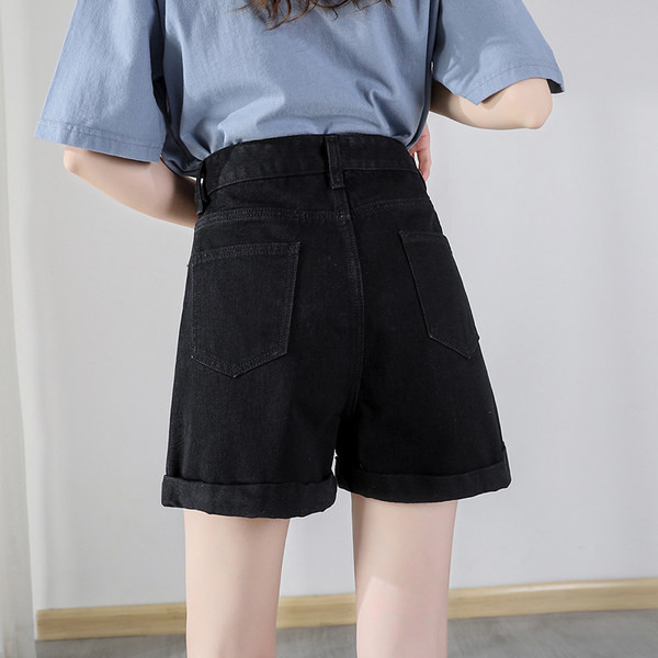 Sieviešu džinsi ar pogām un augstu vidukli