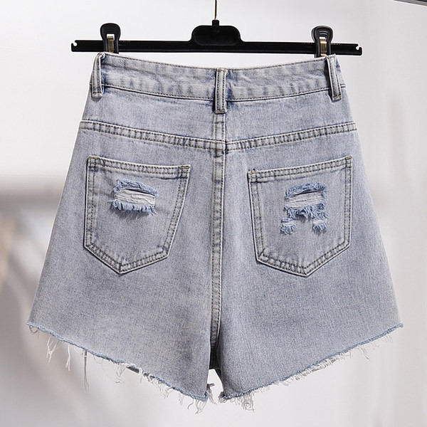 Sieviešu džinsi ar augstu vidukli