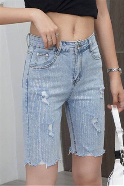 Sieviešu ikdienas bikses 3/4 garumā ar saplēstiem motīviem