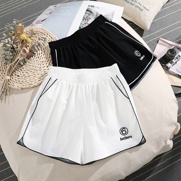 Sieviešu sporta šorti ar apmalēm un izšuvumiem