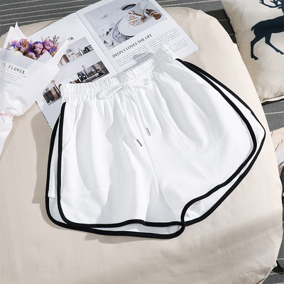 Sieviešu sporta šorti ar apmali vienkrāsainu modeli