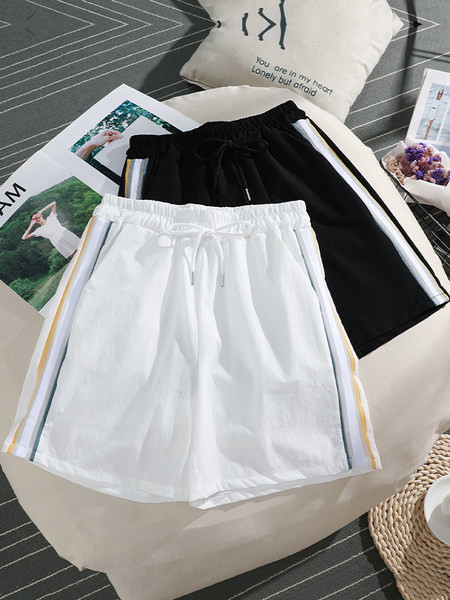 Sieviešu sporta šorti ar augstu vidukli un apmalēm