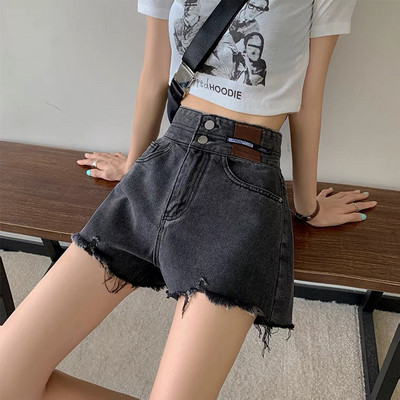 Ženske traper kratke hlače s poderanim motivima i visokim strukom