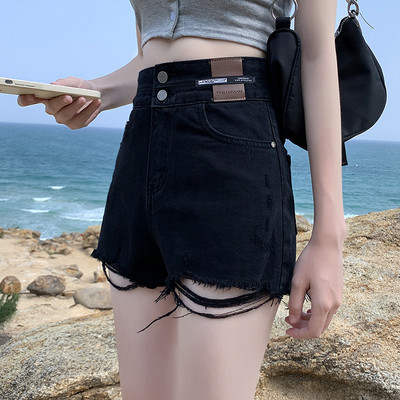 Ženske traper kratke hlače s poderanim motivima i visokim strukom