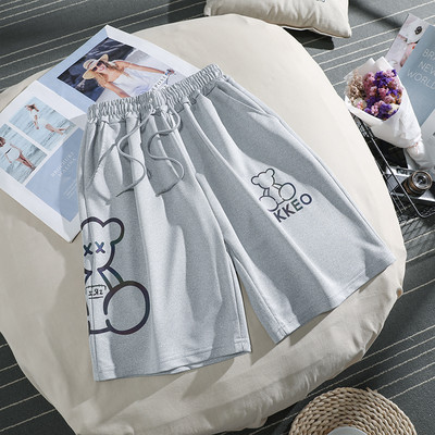 Sieviešu sporta bikses ar saitēm un uzrakstu