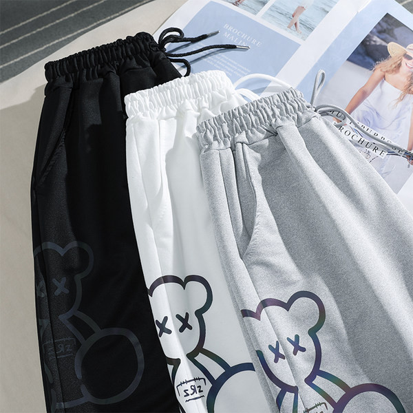 Sieviešu sporta bikses ar saitēm un uzrakstu