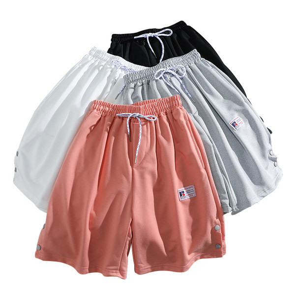 Sieviešu sporta bikses ar saitēm un pogām 3/4 garumā