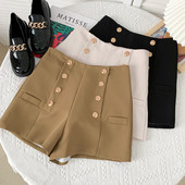 Elegantas sieviešu bikses ar pogām - augsta jostasvieta