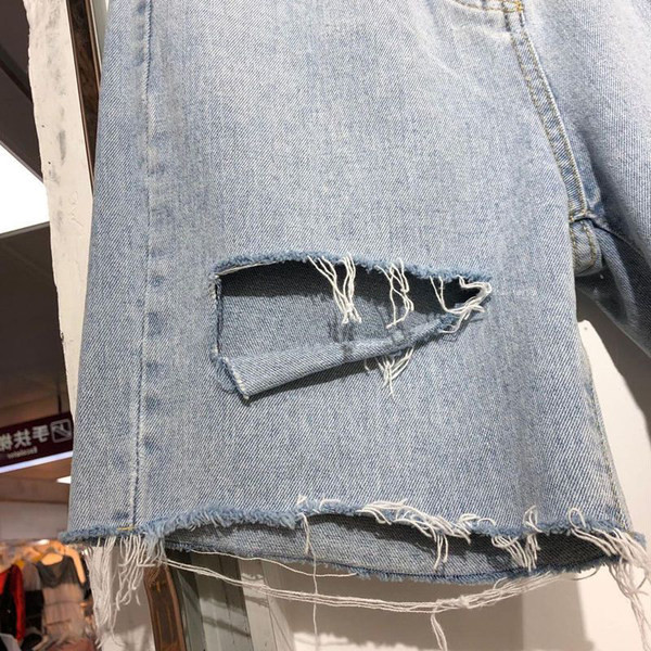 Нов модел дънкови къси панталони с разкъсани мотиви 