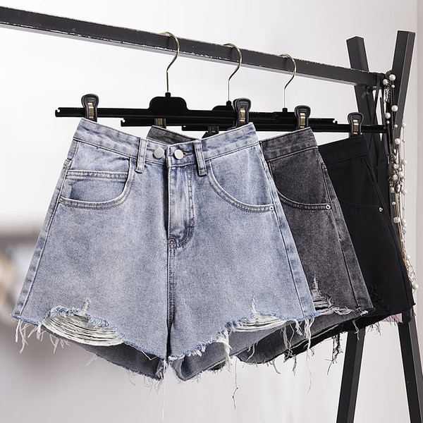 Дамски ежедневни дънкови панталони с разкъсани мотиви