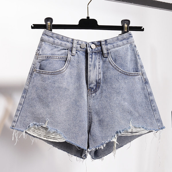 Дамски ежедневни дънкови панталони с разкъсани мотиви