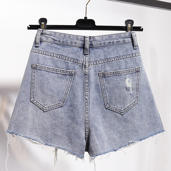 Дамски ежедневни дънкови панталони с разкъсани мотиви