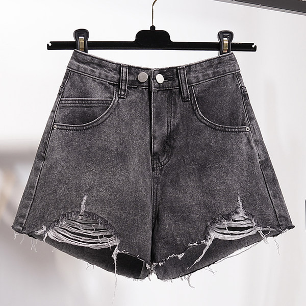 Дамски ежедневни дънкови панталони с разкъсани мотиви