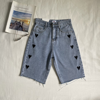 Sieviešu džinsi ar izšuvumu un 3/4 garumu