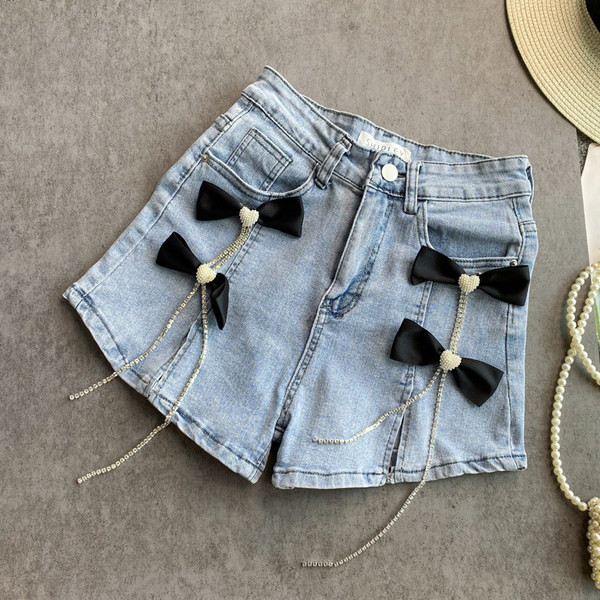 Džinsu šorti ar lentītēm un kabatām
