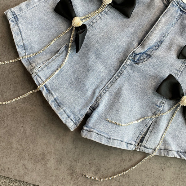 Džinsu šorti ar lentītēm un kabatām