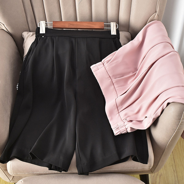 Sieviešu plati šorti ar augstu vidukli un kabatām