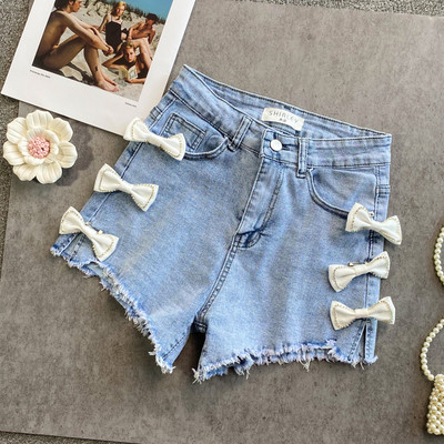 Sieviešu džinsa šorti ar lentīti zilā krāsā