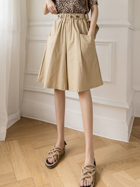 Sieviešu platas bikses ar pogām un dziļām kabatām