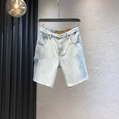 Sieviešu džinsi ar kabatām zilā krāsā