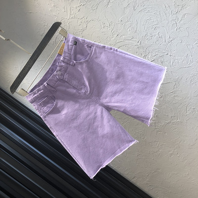 Sieviešu džinsi ar kabatām un augstu vidukli