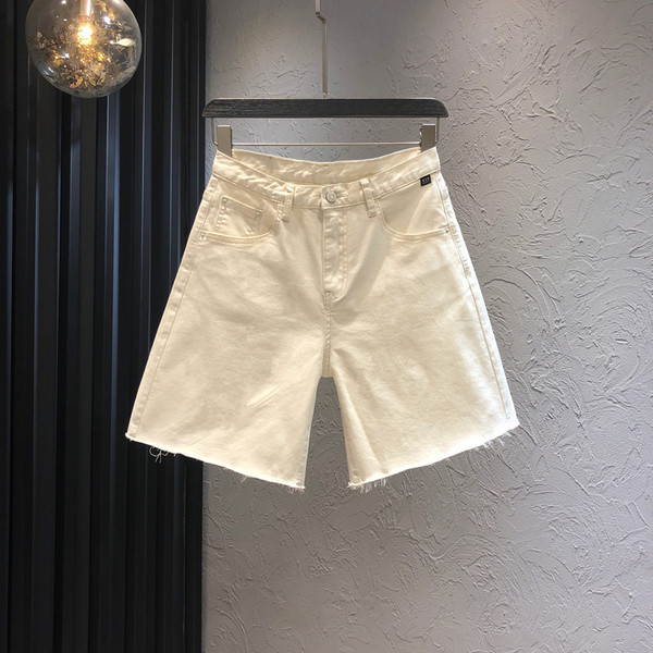 Sieviešu džinsi ar kabatām un augstu vidukli