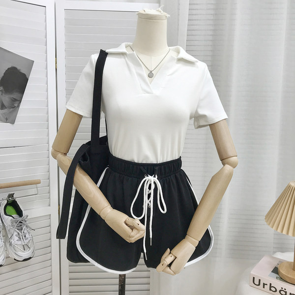 Sieviešu šorti ar saitēm un apmalēm