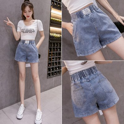 Дамски дънкови къси панталони с ластична талия и емблема 