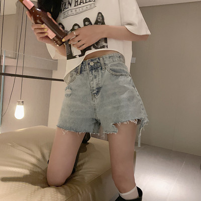 Pantaloni de damă din denim cu motive rupte