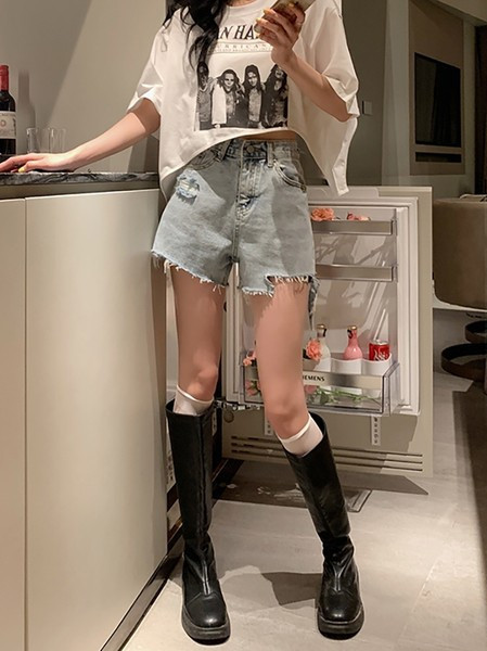 Pantaloni de damă din denim cu motive rupte