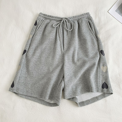 Pantaloni casual de dama cu margini si cravate