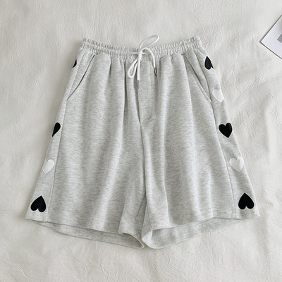 Pantaloni casual de dama cu margini si cravate