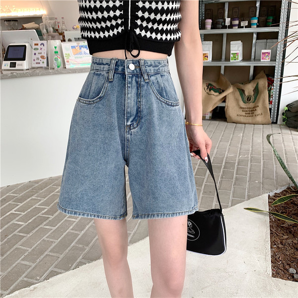 Pantaloni largi de damă din denim cu talie înaltă și buzunare