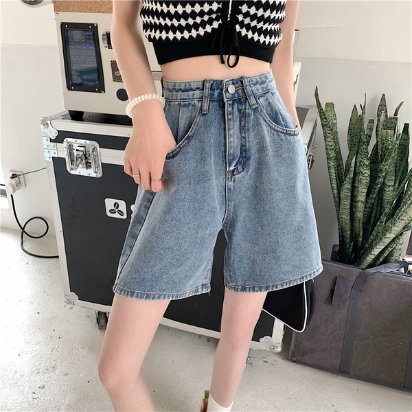 Pantaloni largi de damă din denim cu talie înaltă și buzunare