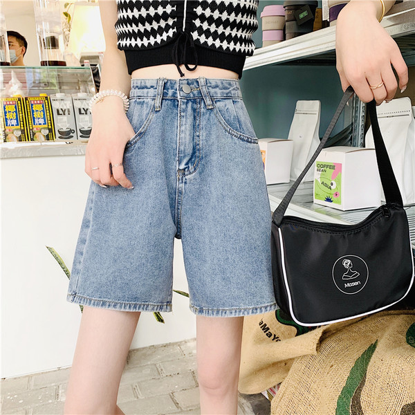 Pantaloni largi de damă din denim cu talie înaltă și buzunare