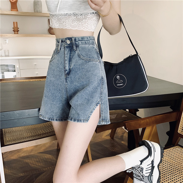 Ženske traperice s visokim strukom i prorezom