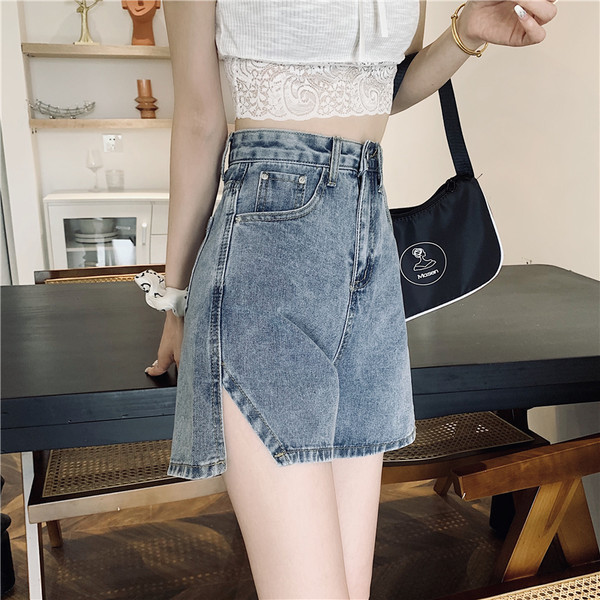 Ženske traperice s visokim strukom i prorezom