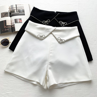 Модерни къси дамски панталони с камъни в бял и черен цвят