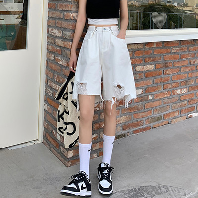 Sieviešu platas bikses ar saplēstu rakstu