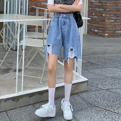 Sieviešu platas bikses ar saplēstu rakstu