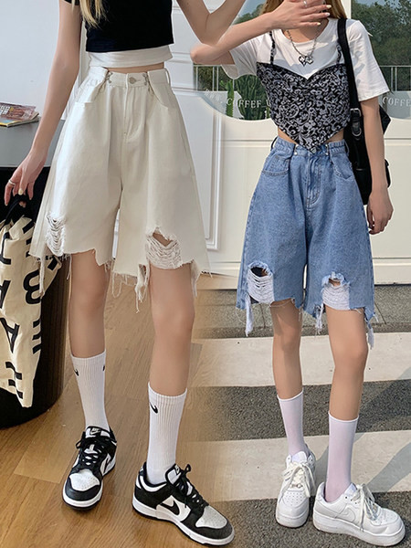 Sieviešu platas bikses ar saplēstu rakstu