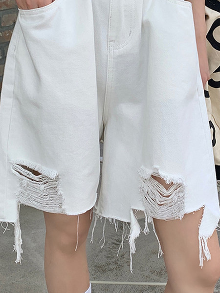 Sieviešu platas bikses ar saplēstu rakstu