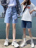 Sieviešu džinsi ar saplēstām tiesībām zilā krāsā