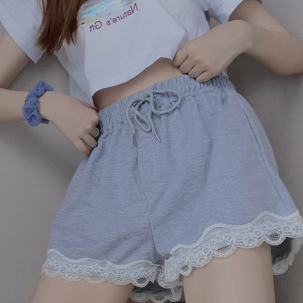 Ženske casual hlače s vezicama i čipkom