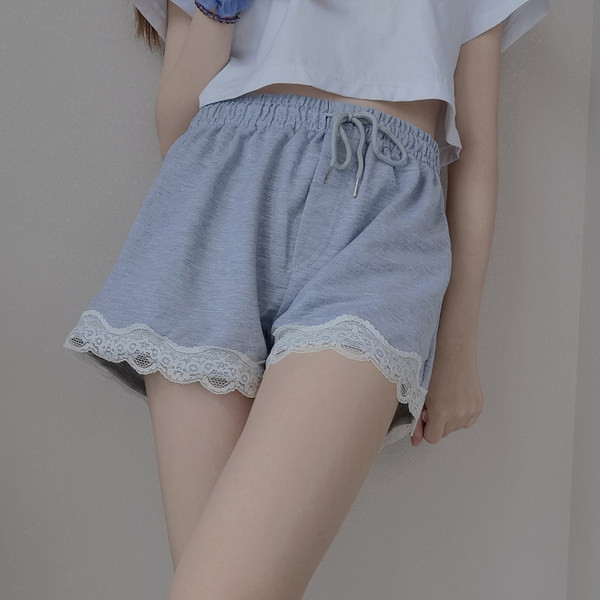 Ženske casual hlače s vezicama i čipkom