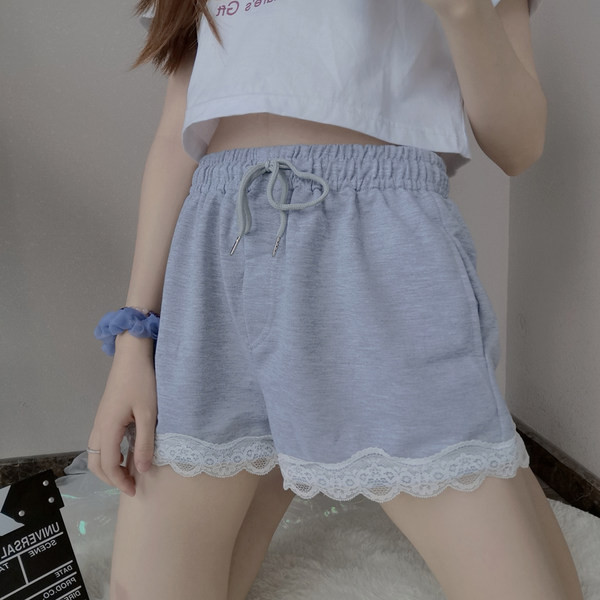 Ženske casual hlače s vezicama i čipkom