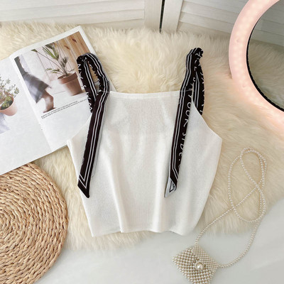 Sieviešu bikses ar lencēm melnā un baltā krāsā