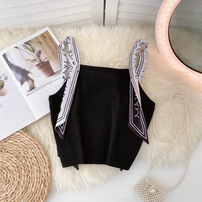 Sieviešu bikses ar lencēm melnā un baltā krāsā