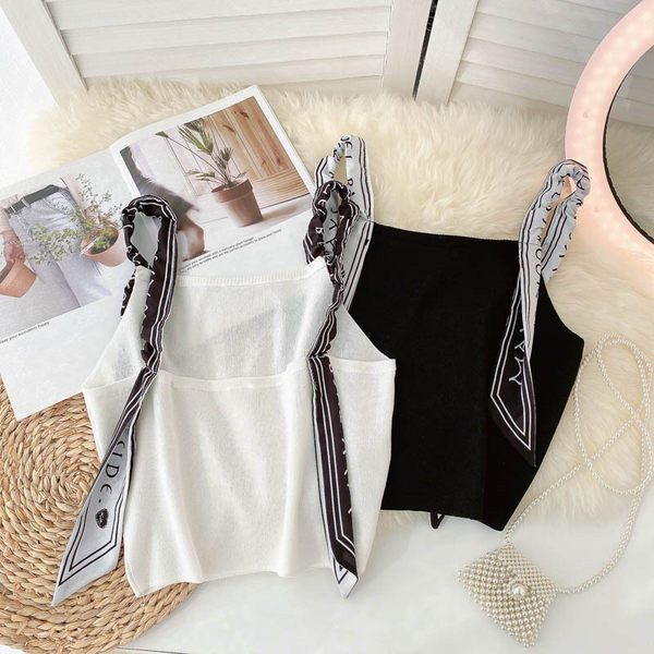 Sieviešu bikses ar lencēm melnā un baltā krāsā