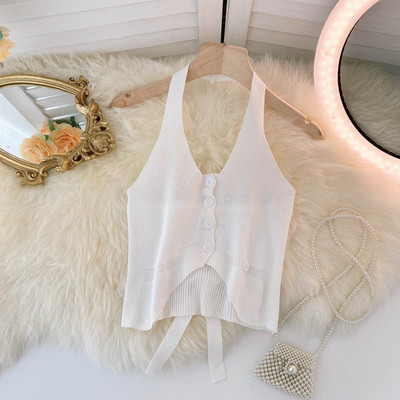 Sieviešu trikotāžas topiņš ar pogām un saitēm